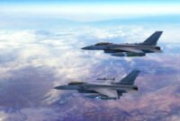 Advanced Fighter Jets Flying Together Above The Clouds. Accelerates And Disappears. War And Air Force Related 3D Illustration Render.