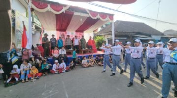 Polsek Pakisaji Kawal Lomba Gerak Jalan HUT RI ke-81, Pastikan Peserta Berlomba Aman dan Tertib