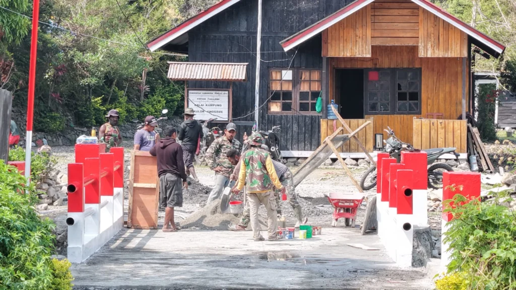 Kodim 1714/Puncak Jaya Jembatan Beton Merah Putih Tahap VII Ke-2 Resmi Digunakan Masyarakat Kampung Kulok Enggame Distrik Pagaleme - Teropong Rakyat